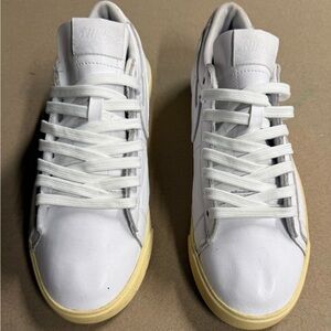 Nike White Minimalist Sneakers with Canvas Upper